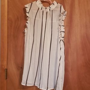 Ruffled sleeve and high neck sheer tank